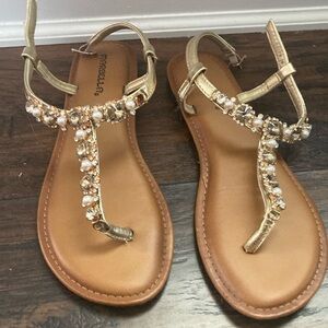 Gold and Brown T-Strap Sandals with Rhinestone Embellishments
